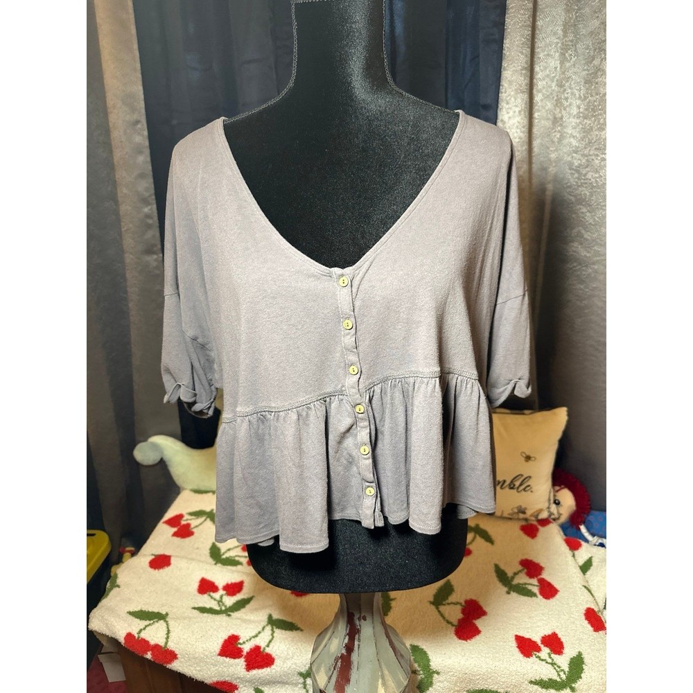 Out from under oversized cropped top